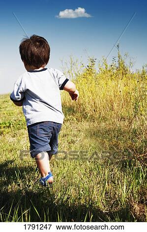 Stock Photo - Child running. Fotosearch