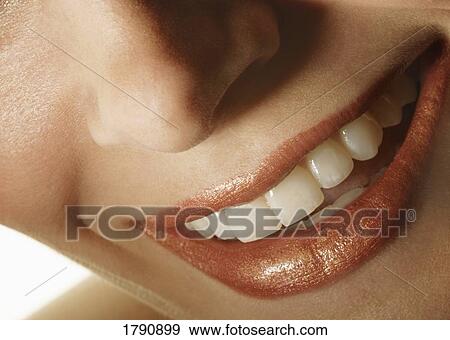 Stock Photo - Close up of a woman's teeth. Fotosearch