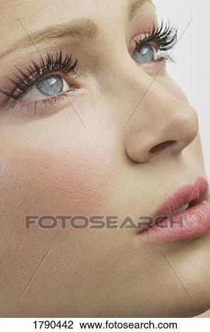 Stock Image - Closeup of woman's face. Fotosearch