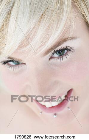 Stock Photograph - Closeup of woman's face. Fotosearch