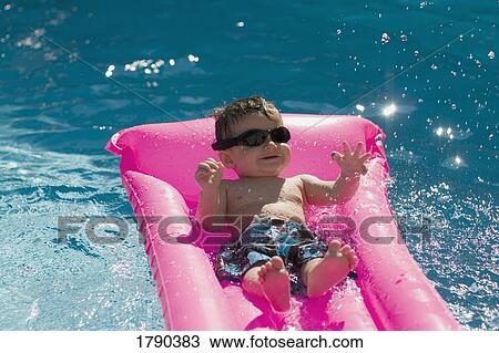 Cool baby in pool View Large Photo Image Stock Image - Cool baby in pool. Fotosearch