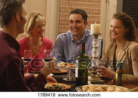 Dinner party View Large Photo Image Stock Photo - Dinner party. Fotosearch