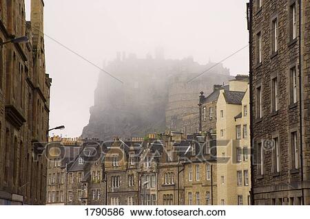 Stock Photograph - Edinburgh Castle in the fog. Fotosearch