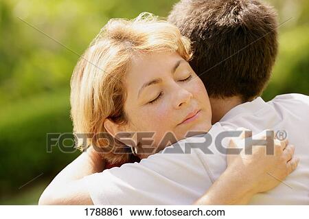 Embracing family View Large Photo Image Stock Image - Embracing family. Fotosearch