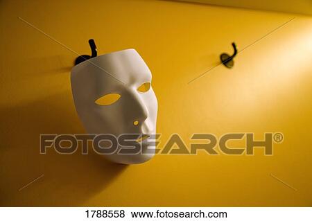 Face mask on hanger View Large Photo Image Stock Photo - Face mask on hanger. Fotosearch