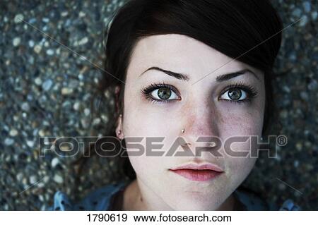Face of a young woman View Large Photo Image Stock Photo - Face of a young woman. Fotosearch