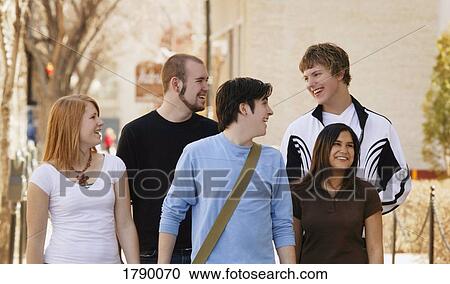 Friends walking View Large Photo Image Stock Image - Friends walking. Fotosearch