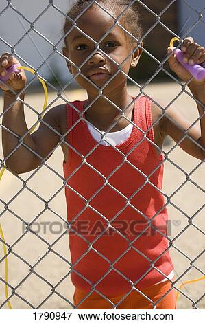 Girl with skipping rope View Large Photo Image Stock Photo - Girl with skipping rope. Fotosearch