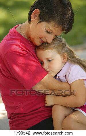 Grandma gives a hug View Large Photo Image Stock Image - Grandma gives a hug. Fotosearch