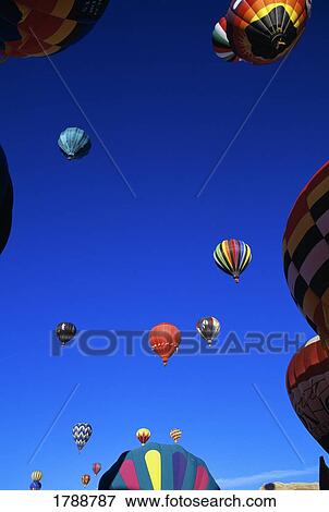 Hot air balloons in flight View Large Photo Image Stock Photo - Hot air balloons in flight. Fotosearch