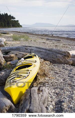 Stock Photo - Kayak at the beach. Fotosearch