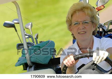 Lady golfer View Large Photo Image Stock Photo - Lady golfer. Fotosearch