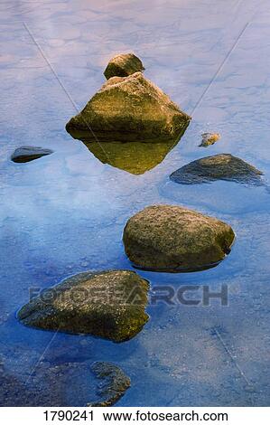 Large stepping stones in water View Large Photo Image Stock Image - Large stepping stones in water. Fotosearch