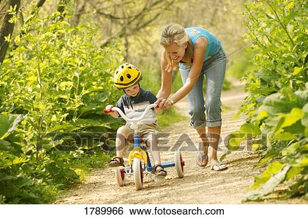 Learning to Ride a Bike View Large Photo Image Stock Photograph - Learning to Ride a Bike. Fotosearch