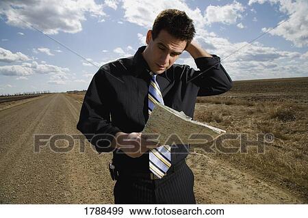 Lost businessman View Large Photo Image Stock Photo - Lost businessman. Fotosearch
