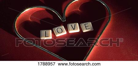 Love spelled inside heart View Large Photo Image Stock Photo - Love spelled inside heart. Fotosearch