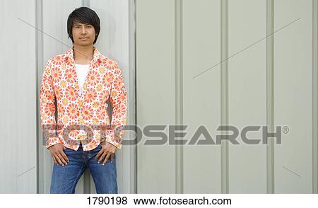 Man against wall View Large Photo Image Stock Photo - Man against wall. Fotosearch
