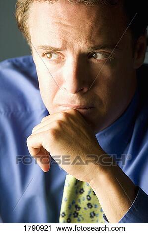 Stock Image - Man contemplating. Fotosearch