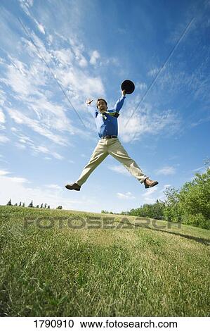 Man jumping in excitement View Large Photo Image Stock Image - Man jumping in excitement. Fotosearch