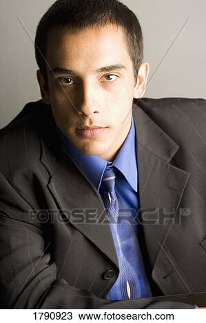 Stock Image - Man wearing a suit. Fotosearch