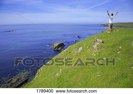 Stock Image - Man with arms raised. Fotosearch