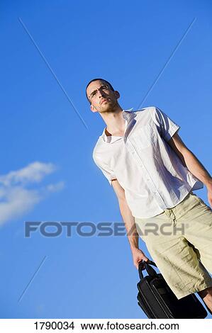 Man with briefcase View Large Photo Image Picture - Man with briefcase. Fotosearch