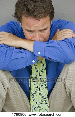 Man with sad and worried facial expression View Large Photo Image Stock Photograph - Man with sad and worried facial expression. Fotosearch