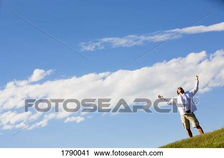 Man worshipping outdoors View Large Photo Image Stock Image - Man worshipping outdoors. Fotosearch