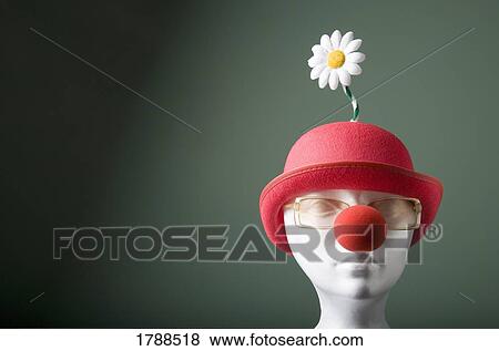 Stock Photo - Mannequin with hat and clown nose. Fotosearch