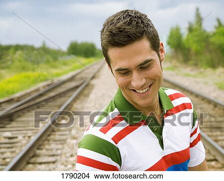 Mid-adult man laughing View Large Photo Image Picture - Mid-adult man laughing. Fotosearch