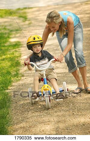how to teach a child to ride a tricycle