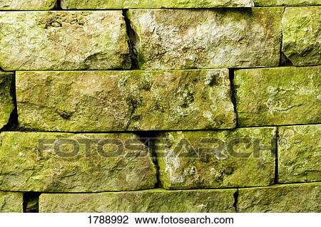 Stock Image - Mossy Stone Wall. Fotosearch