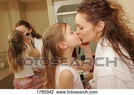 Mother and daughter getting dressed up View Large Photo Image Stock Image - Mother and daughter getting dressed up. Fotosearch
