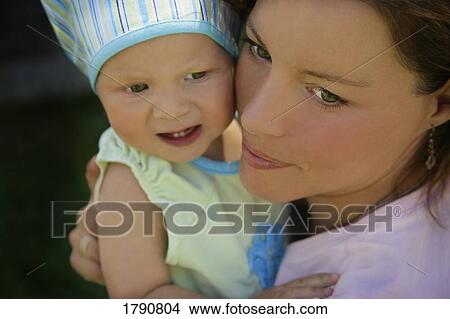 Picture - Mother and daughter together. Fotosearch