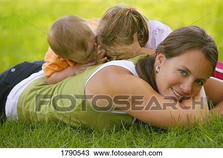 Stock Image - Mother with children. Fotosearch
