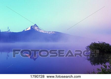 Stock Photo - Mount Washington reflection in Big Lake, Oregon. Fotosearch