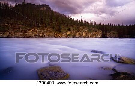 Stock Image - Moving river scenic. Fotosearch