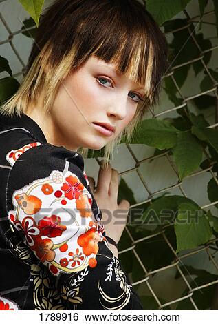 Stock Photograph - Portrait of a woman. Fotosearch