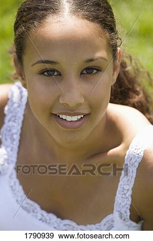 Stock Photo - Portrait of a young woman. Fotosearch