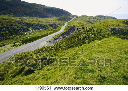 Road through green hills View Large Photo Image Stock Image - Road through green hills. Fotosearch