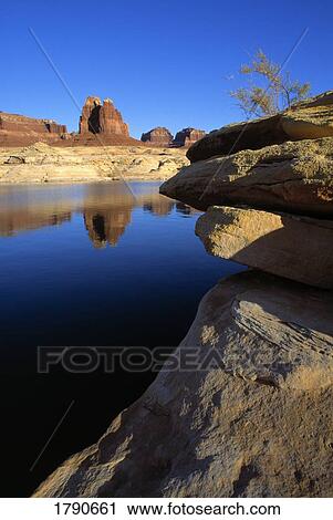 Stock Image - Sandstone formations with water reflection. Fotosearch