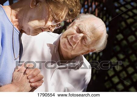 Picture - Senior prays. Fotosearch