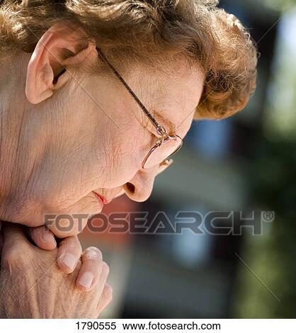 Senior woman praying View Large Photo Image Stock Photography - Senior woman praying. Fotosearch