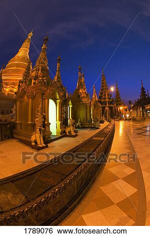 Stock Photograph - Shwedagon Pagoda at night, Yangon, Myanmar. Fotosearch