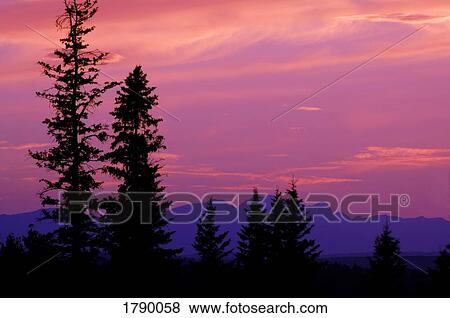 Stock Photo - Silhouette of a mountain scene. Fotosearch