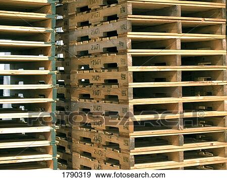 Stock Photo - Stacks of wooden palettes. Fotosearch