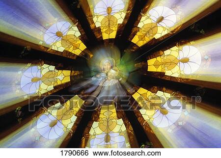 Stock Photograph - Stained glass window in Saint Boniface Catholic Church. Fotosearch