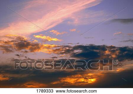 Stock Image - Sunset clouds. Fotosearch