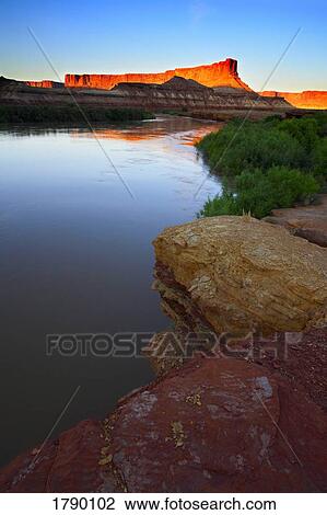 Sunset over red cliffs, Utah View Large Photo Image Stock Image - Sunset over red cliffs, Utah. Fotosearch