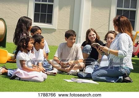 Teaching outside View Large Photo Image Stock Photograph - Teaching outside. Fotosearch